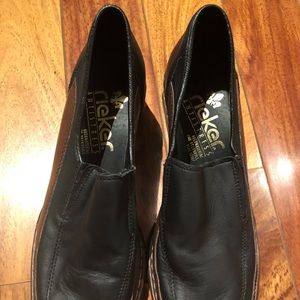 Black leather ladies shoes .